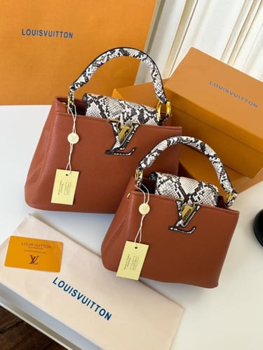 شنطه ماركه لويس فيتون جلد الثعبان