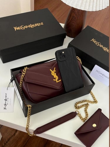 شنطه ماركه سان لوران مع بوك صغير