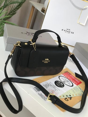 شنطه ماركه كوتش