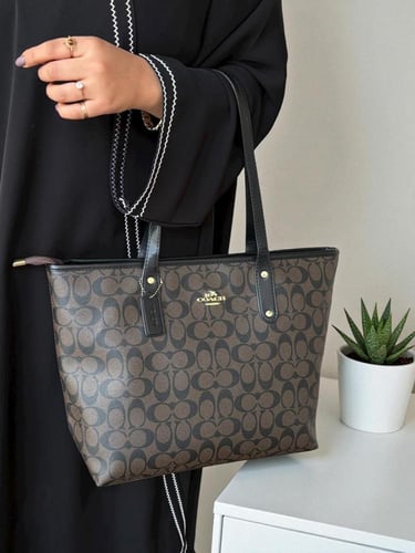 شنطه ماركه كوتش