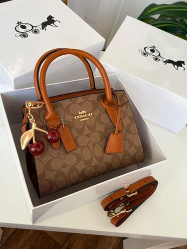 شنطه ماركه كوتش