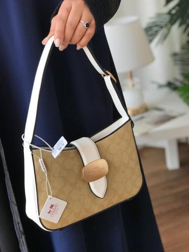 شنطه ماركه كوتش