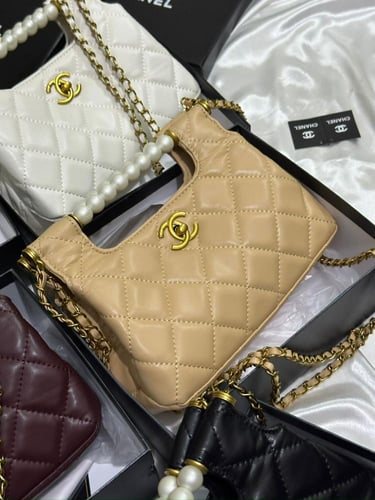 شنطه ماركه شانيل العصريه بتصميم الؤلؤ