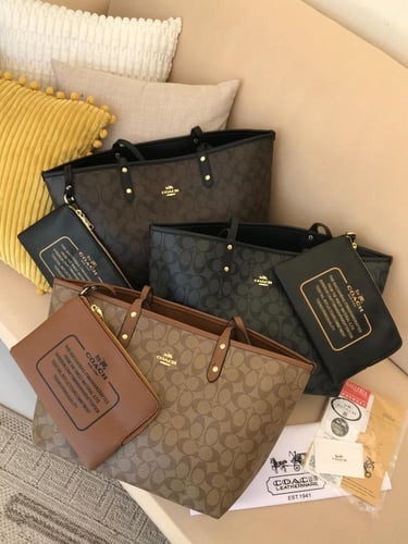 شنطة كوتش دبل فيس