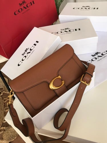 شنطه ماركه كوتش وسط