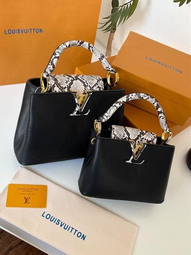 شنطه ماركه لويس فيتون جلد الثعبان