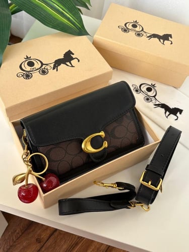 شنطه ماركه كوتش بمعه