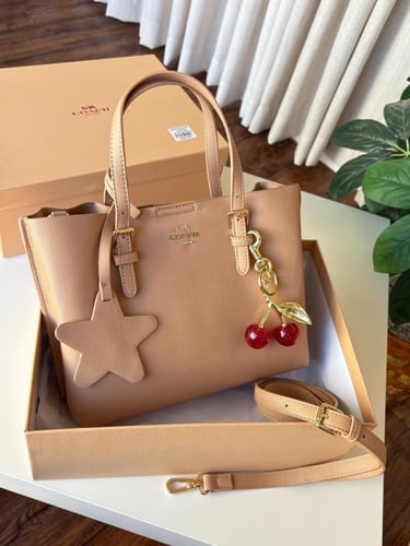 شنطه ماركه كوتش