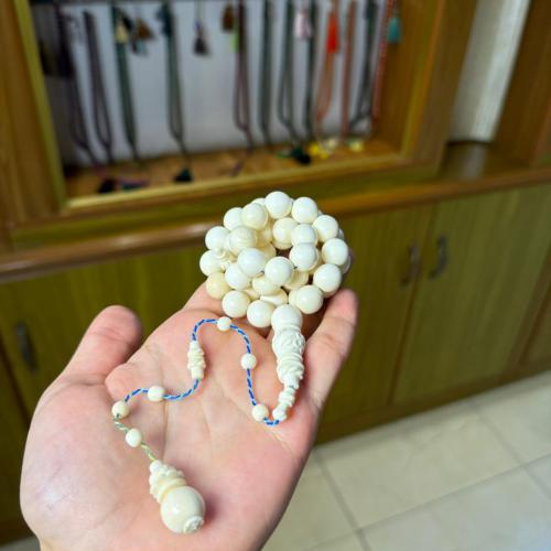 عاج طبيعي منقوش