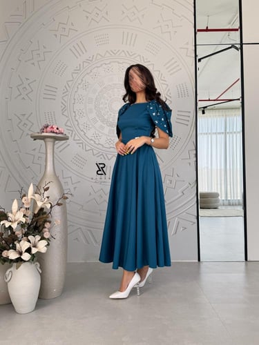 فستان انيق بـ أكمام شك