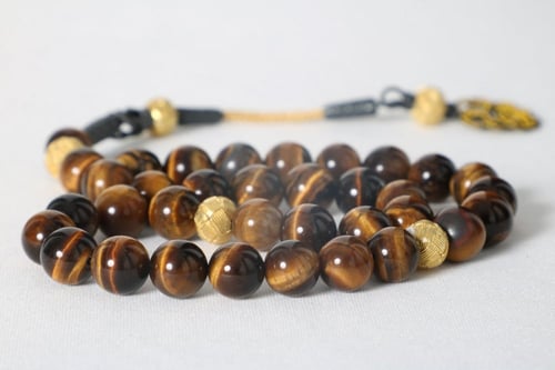 سبحة عين النمر الأصفر