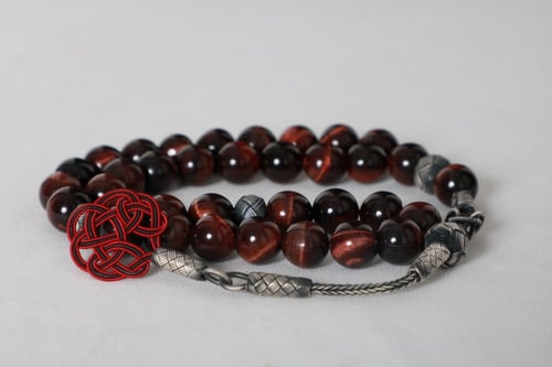 سبحة عين النمر العنابي