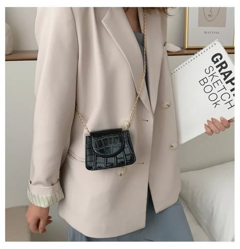 شنطة جلد صغيرة اطفال