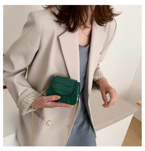 شنطة جلد صغيرة اطفال