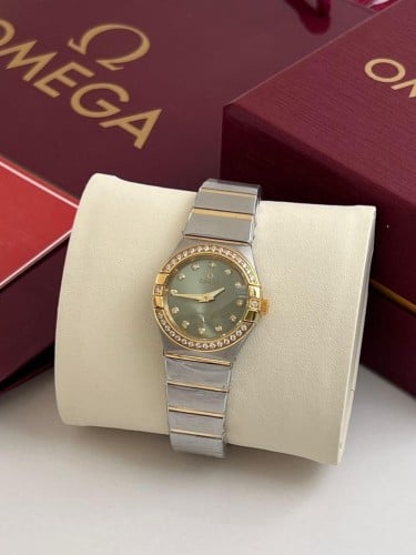 ساعه اوميقا كرستال اخضر درجه اولئ مع ملحقات المارك...