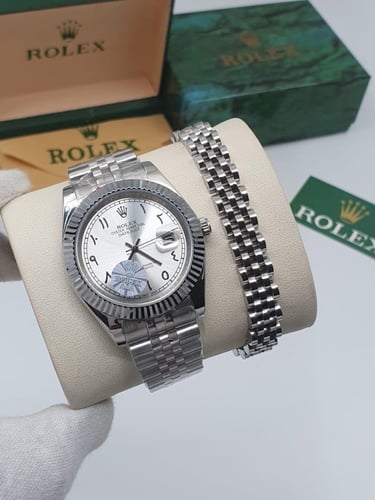 ساعه مع اسوارة من رولكس الدرجة الاولى مع جميع المل...