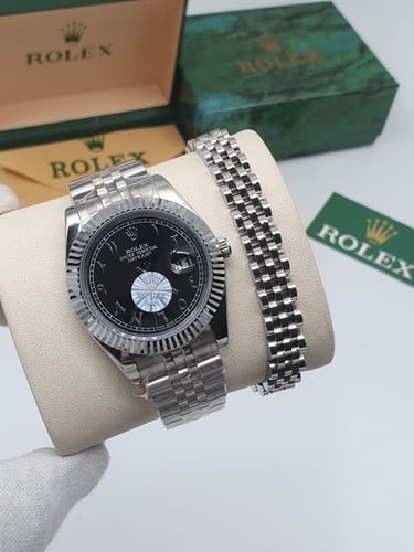 ساعه مع اسوارة من رولكس الدرجة الاولى مع جميع المل...