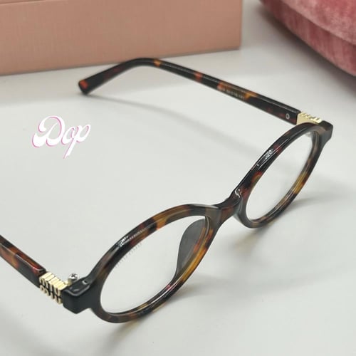 نظارة مـو ميو بإطار تايقر وعدسات مستديرة شفافة