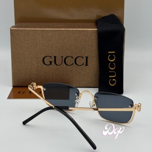 نظارة قوتشي بدون أطار ذهبي بعدسة سوداء