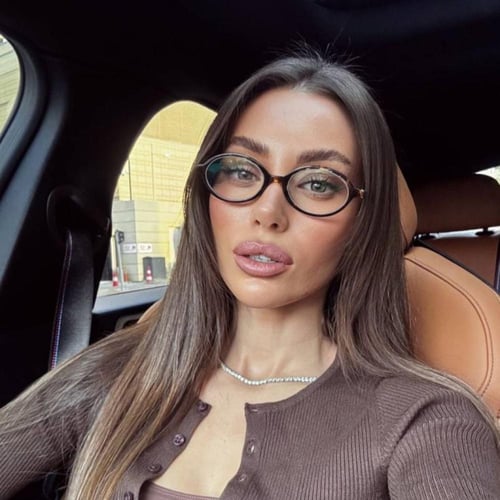 نظارة مـو ميو بإطار تايقر وعدسات مستديرة شفافة