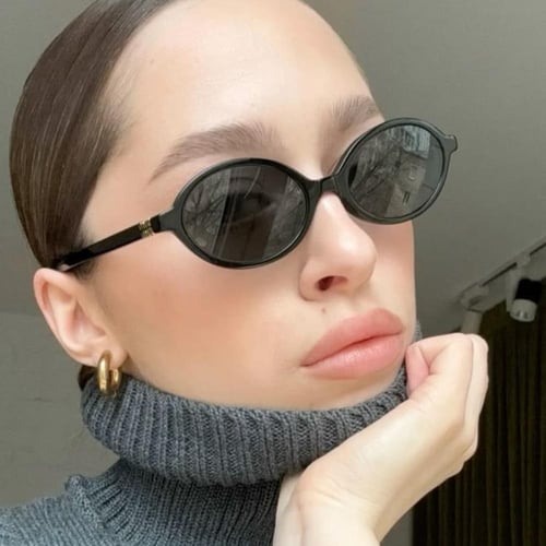 نظارة ميو ميو بإطار أسود وعدسات مستديرة