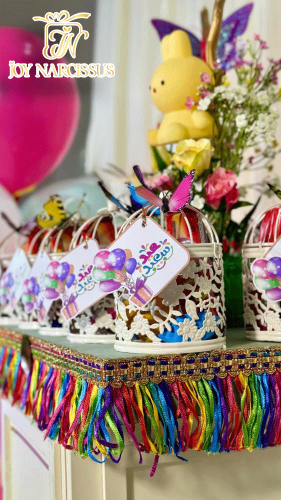 إستاند و توزيعات أقفاص العيد