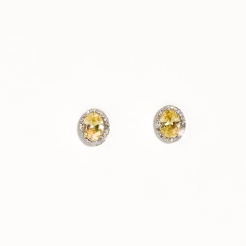 Diamond ring, white gold, yellow stone
