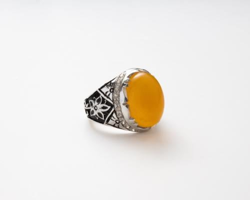 خاتم شرف الشمس مرصع بالزركون