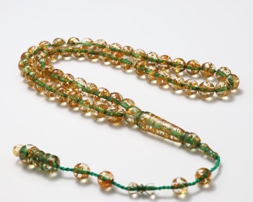 سبحة بكلايت شفاف مذهب 51 حبة