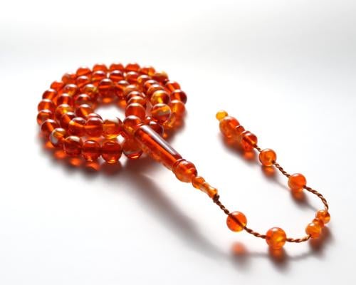 سبحة بكلايت باللون الكهرماني الفريد