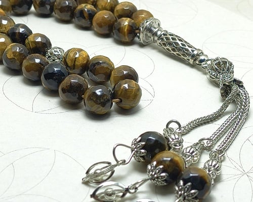 سبحة عين النمر 33 حبة بقصة مترشة