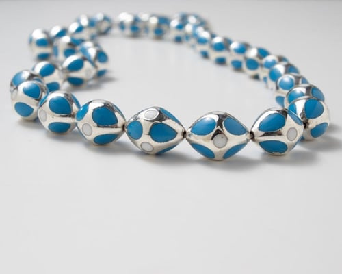 سبحة فيروز فاخرة مزينة بالفضة بتصميم القفص