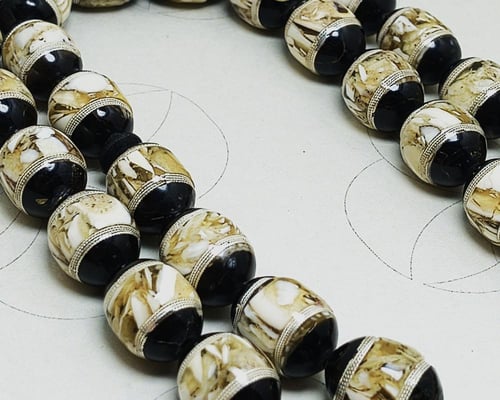 سبحة النوادر (عاج، كهرمان، كوك) - تصميم "النجف" ال...