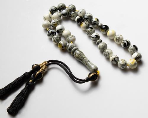 سبحة تراب الكهرمان الابيض المموج