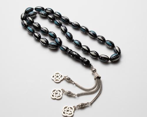 سبحة خشب الكوك مزينة بنقوش الفيروز 33حبة