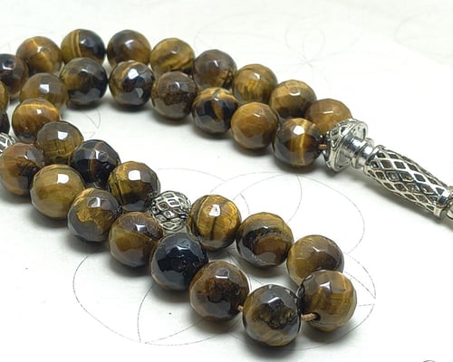 سبحة عين النمر 33 حبة بقصة مترشة