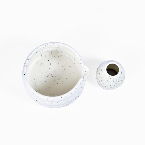 المجموعة المتكاملة ابيض منقط اسود