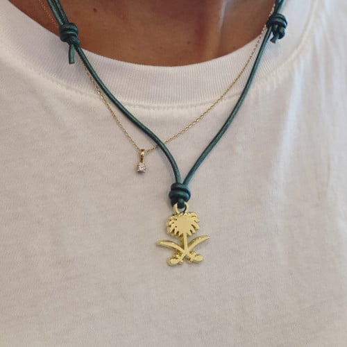 عقد شعار المملكة سيفين ونخله