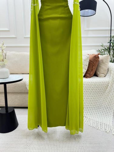 فستان سهرة اخضر مميز بتطريز