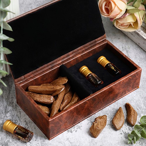 عبوتين ¼ تولة دهن و50 جرام عود موروكي