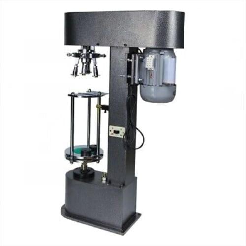 ماكينة تقفيل اغطية القوارير