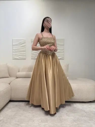 فستان سهرة ذهبي مكسر بتطريز فاخر