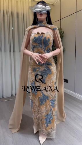 فستان سهرة فاخر بتطريز فني وكاب أنيق