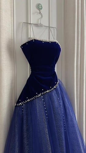 فستان سهره أزرق ملكي بتطريز لؤلؤ فخم