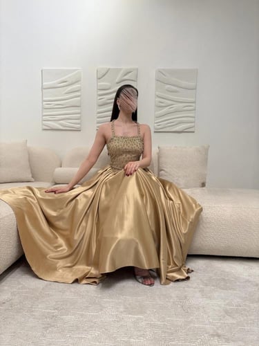 فستان سهرة ذهبي مكسر بتطريز فاخر