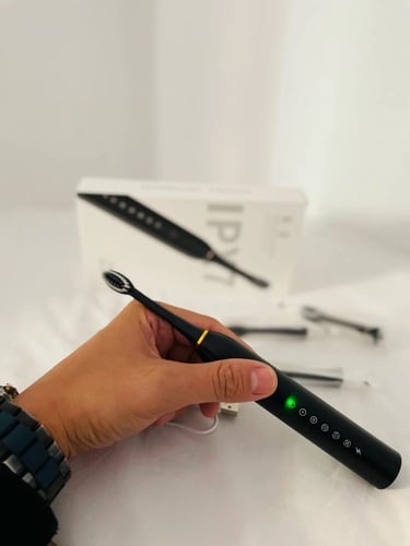 عرض الخيط المائي + فرشاة الاسنان الكهربائية