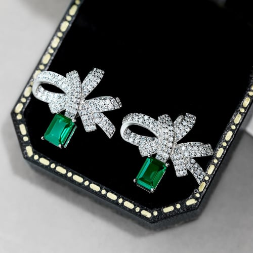 اقراط ايمرلد فضي