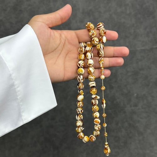 مسباح عاج مع كهرمان طبيعي كبس تمليكة