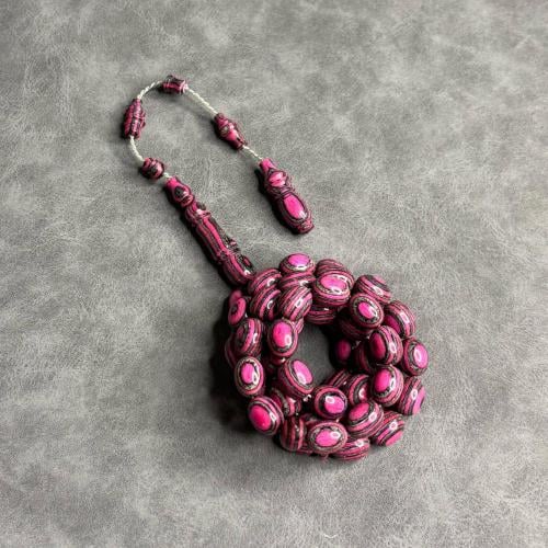 سبحة خشب مضغوط زهري