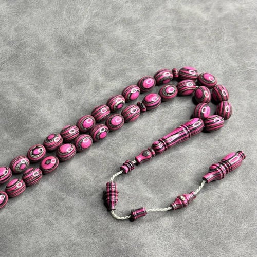 سبحة خشب مضغوط زهري